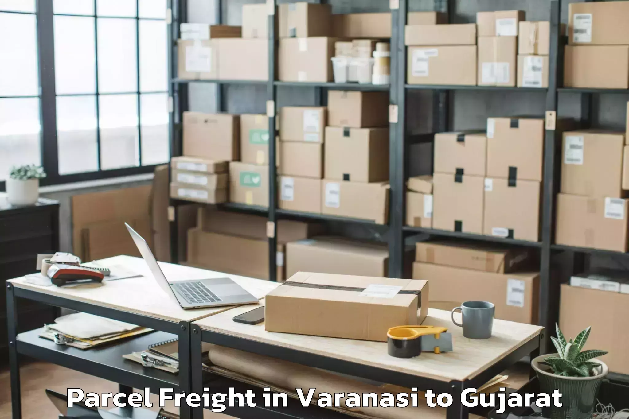 Book Your Varanasi to Netrang Parcel Freight Today